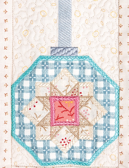 Decorative stitching on the Decorating the Tree quilt